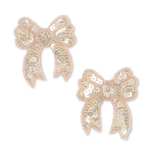 Load image into Gallery viewer, Pair of rose gold bow-shaped earrings on a white background
