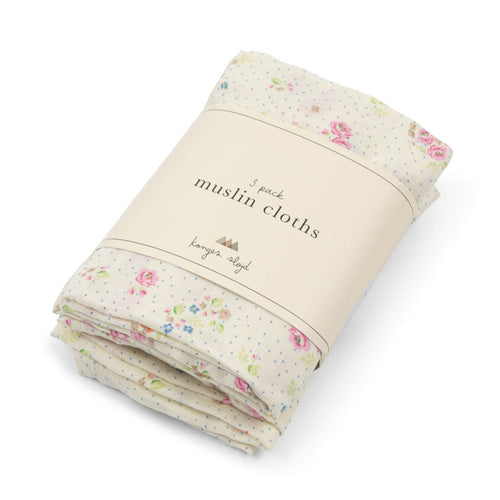 Pack of floral muslin cloths with a label on a white background