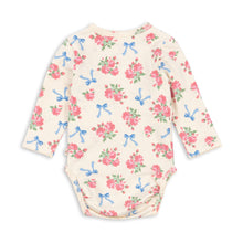 Load image into Gallery viewer, Baby bodysuit with floral and bow pattern on a white background