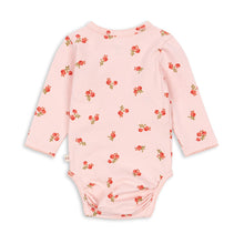 Load image into Gallery viewer, Pink baby onesie with floral pattern on a white background