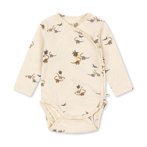 Baby onesie with dinosaur pattern on a white background