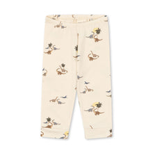 Load image into Gallery viewer, Beige pants with dinosaur print on a white background