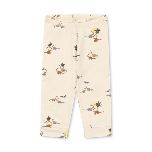 Beige pants with dinosaur print on a white background