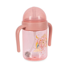 Load image into Gallery viewer, Pink sippy cup with handle and character design on a white background