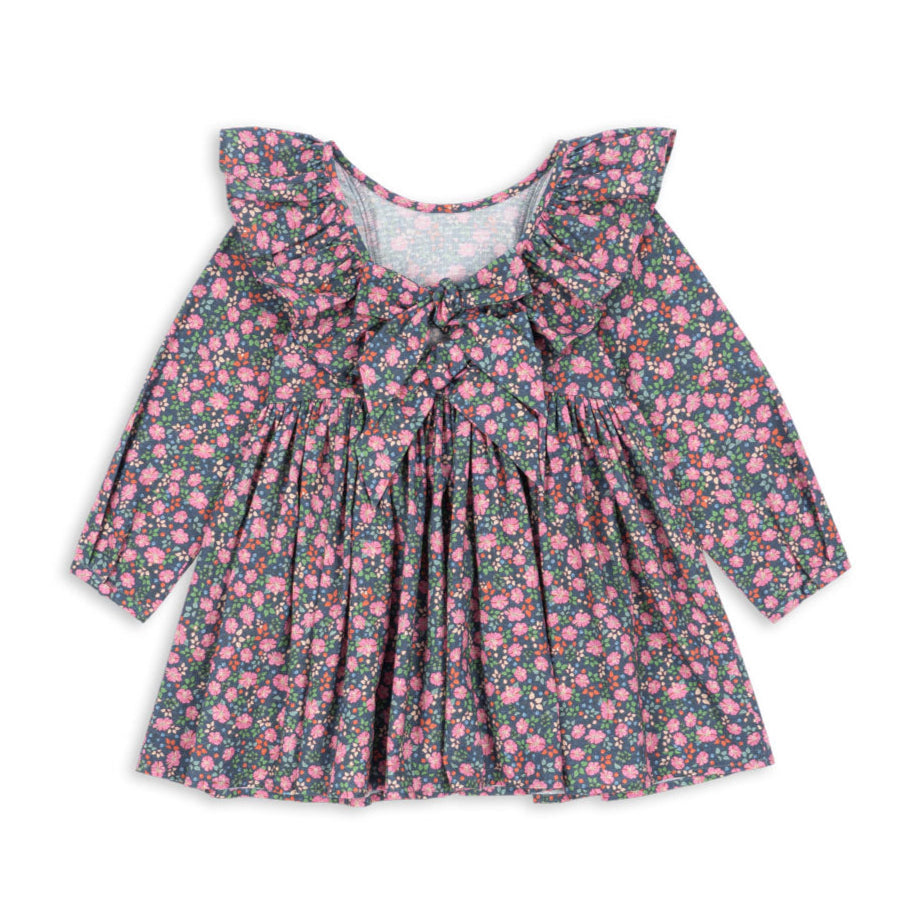 Floral dress with ruffled neckline on a white background