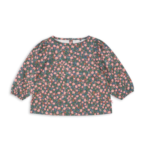 Floral patterned blouse on a white background