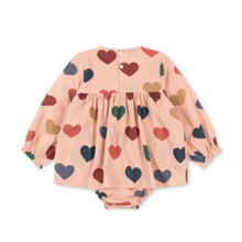 Load image into Gallery viewer, Baby dress with heart pattern on a white background