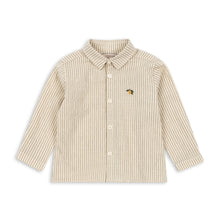 Load image into Gallery viewer, Beige and white striped shirt with a small embroidered design on a white background