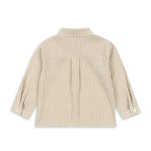 Beige striped shirt on a white background