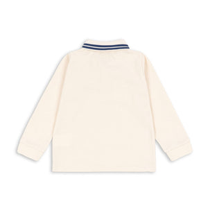 Beige long-sleeve shirt with a striped collar on a white background