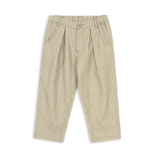 Beige and brown striped pants on a white background