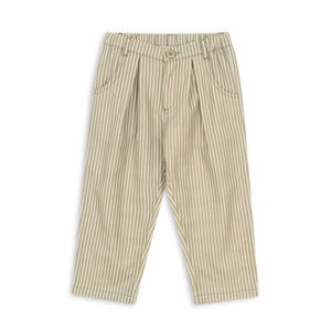 Beige and brown striped pants on a white background
