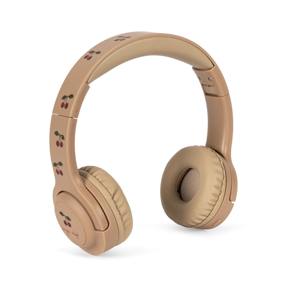 Beige headphones on a white background