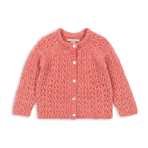 Pink knitted cardigan on a white background