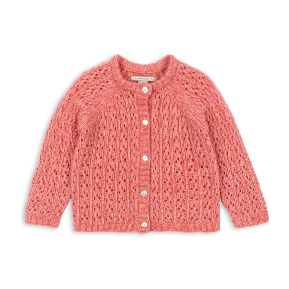 Pink knitted cardigan on a white background