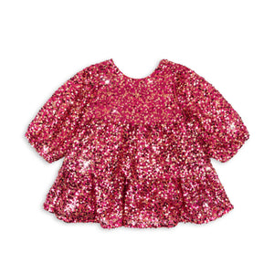 Pink sequin dress on a white background