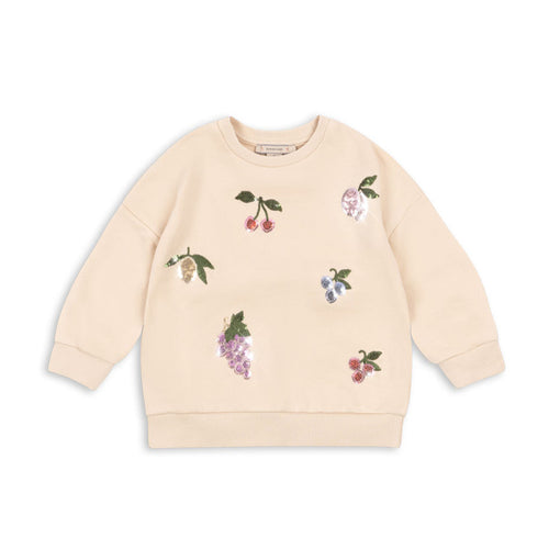 Beige sweatshirt with floral embroidery on a white background