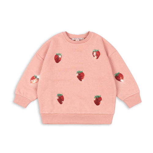Pink sweatshirt with strawberry patterns on a white background