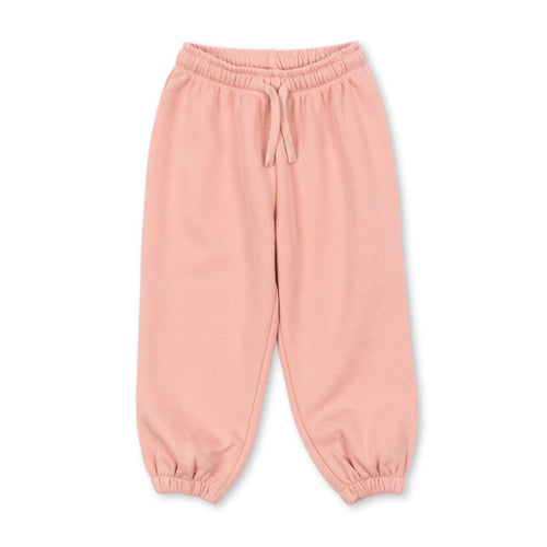 Pink sweatpants on a white background