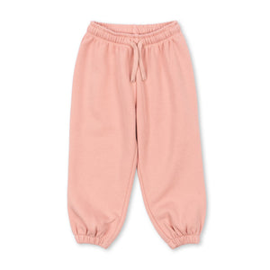 Pink sweatpants on a white background