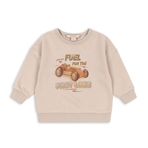 Beige sweatshirt with graphic design on a white background