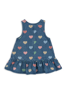 Denim dress with colorful heart pattern on a white background