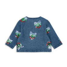 Load image into Gallery viewer, Blue sweater with embroidered designs on a white background