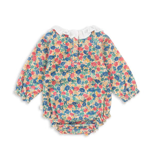 Floral baby romper on a white background
