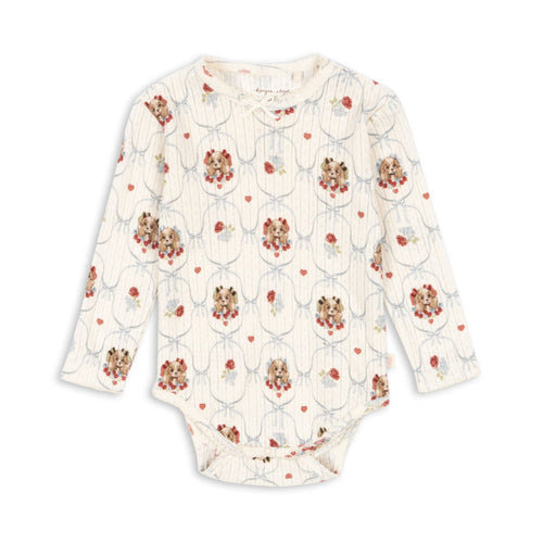Floral-patterned baby onesie on a white background