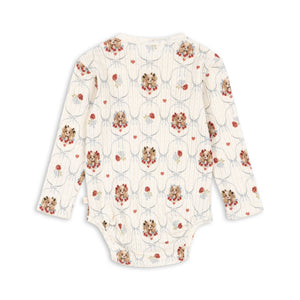Floral-patterned baby onesie on a white background