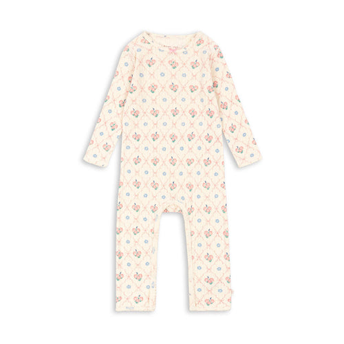 Baby onesie with floral pattern on a white background