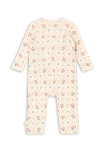 Baby onesie with floral pattern on a white background