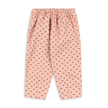 Load image into Gallery viewer, Pink pants with red heart pattern on a white background