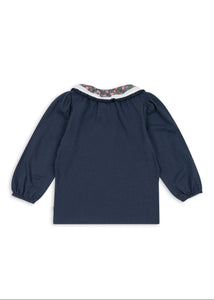 Navy blue blouse with long sleeves on a white background