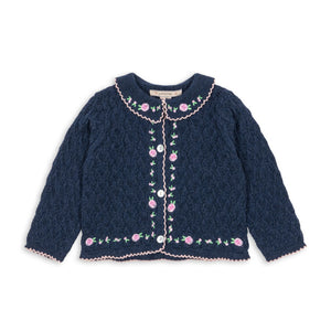 Navy blue cardigan with floral embroidery on a white background