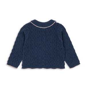 Navy blue textured sweater on a white background