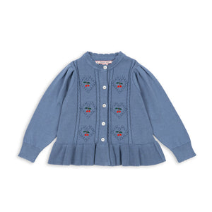 Blue cardigan with floral patterns on a white background