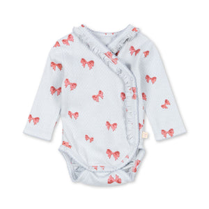 Baby wrap with pink bow pattern on a white background