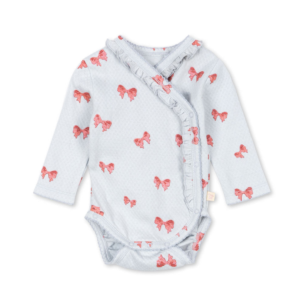 Baby wrap with pink bow pattern on a white background