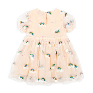 Beige dress with green floral patterns on a white background