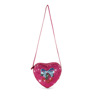 Heart-shaped pink purse with a blue butterfly design on a white background