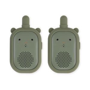 Two green animal-shaped walkie-talkies on a white background