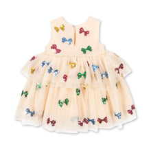 Load image into Gallery viewer, Beige dress with colorful bow patterns on a white background