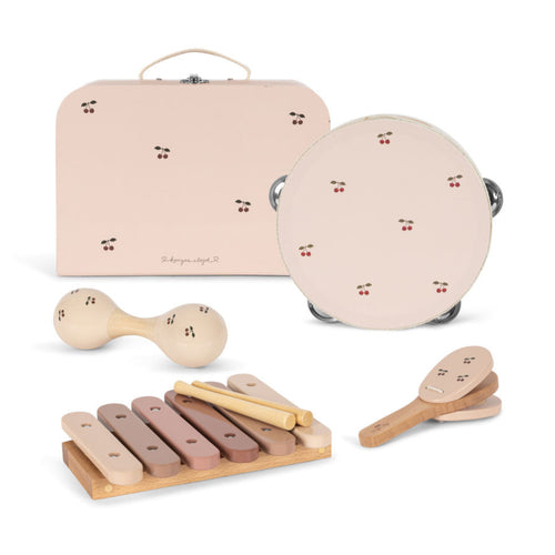 Set of musical instruments including a tambourine, xylophone, and shakers on a white background