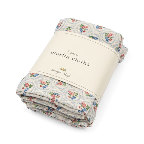 Pack of muslin cloths with floral pattern on a white background