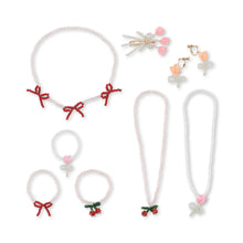 Load image into Gallery viewer, Set of hair accessories including hair ties and clips on a white background