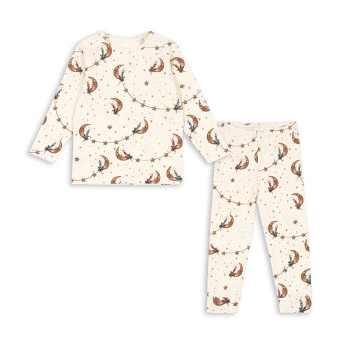 Children's pajama set with animal pattern on a white background