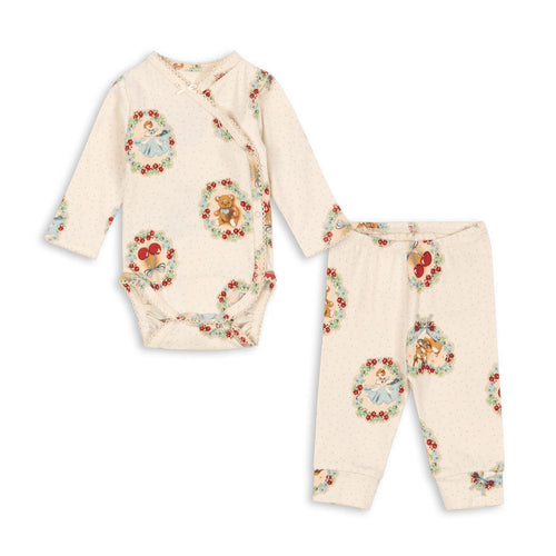 Baby outfit set with floral pattern on a white background