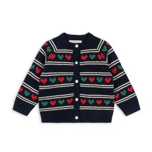 Navy cardigan with red and green heart patterns on a white background