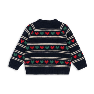 Navy sweater with heart pattern on a white background